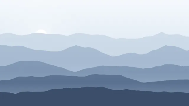 Fond d'écran chaînes de montagnes en couches dans la brume, soleil bas, teintes hiver