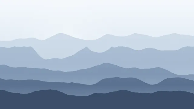 Fond d'écran chaînes de montagnes en couches dans la brume, soleil bas, teintes hiver